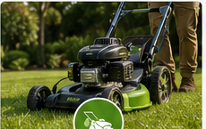 Lawn mower cutting grass